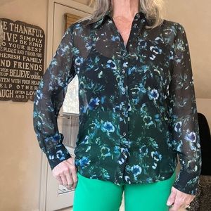 Haute hippie long sleeved blouse with cut out back.